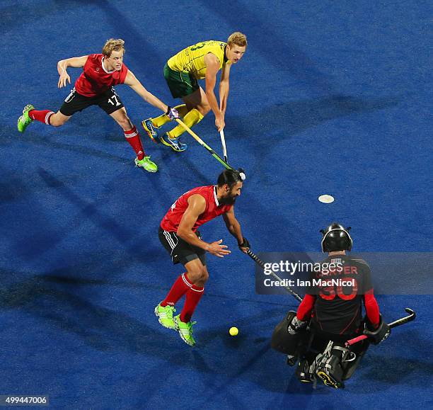 Canadian goalkeeper David Carter is beaten by the shot of Daniel Beale of Australia during the match between Australlia and Canada on day five of The...