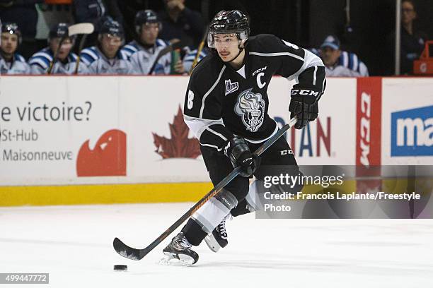 Alexandre Carrier of the Gatineau Olympiques skates with the puck against the Chicoutimi Sagueneens on November 27, 2015 at Robert Guertin Arena in...