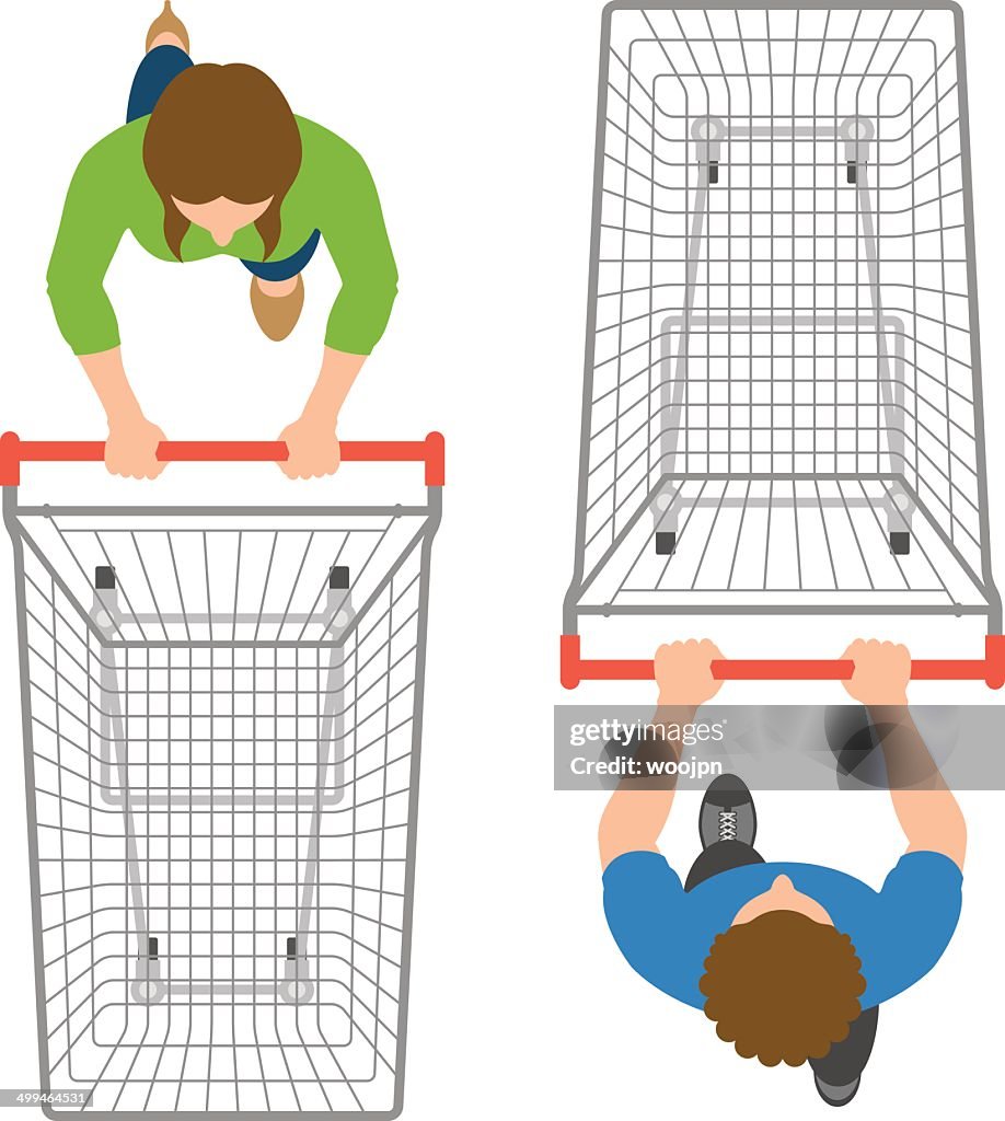 Overhead view of man and woman pushing empty trolleys