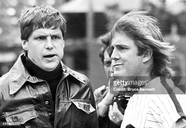 Pitcher Tug McGraw of the Philadelphia Phillies talks with former teammate Tom Seaver, now of the Cincinnati Reds, before Game 1 of the 1980 World...
