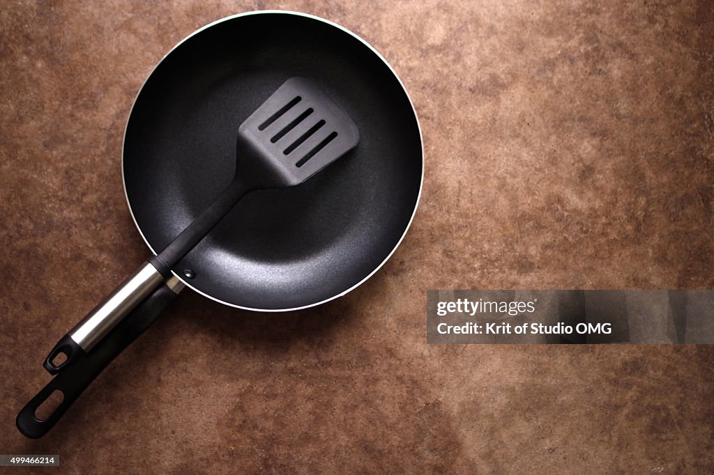 Teflon Pan And Spatula High-Res Stock Photo - Getty Images