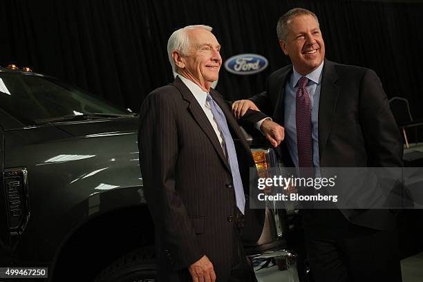 Joseph "Joe" Hinrichs, executive vice president and president of the Americas for Ford Motor Co., right, and Steven "Steve" Beshear, governor of...