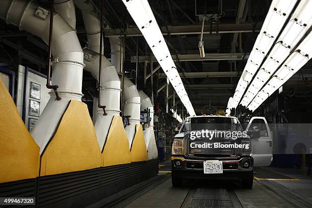 Ford Motor Co. Super Duty series pickup truck moves down an assembly line at the company's truck manufacturing plant in Louisville, Kentucky, U.S.,...