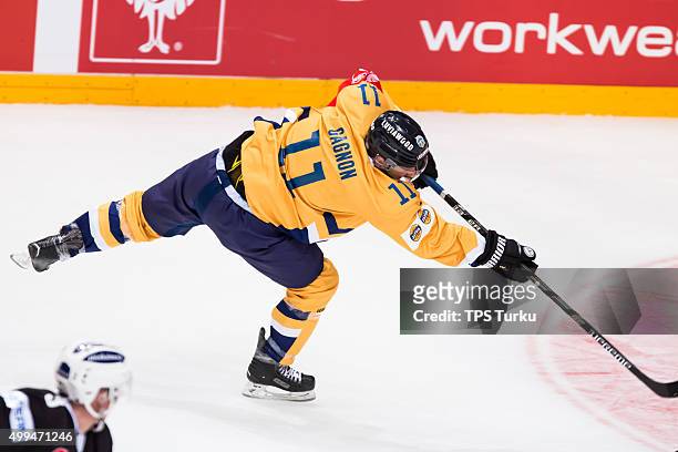 Aaron Gagnon shoots during the Champions Hockey League quarter final between TPS Turku and Lukko Rauma at HK Areena on December 1, 2015 in Turku,...
