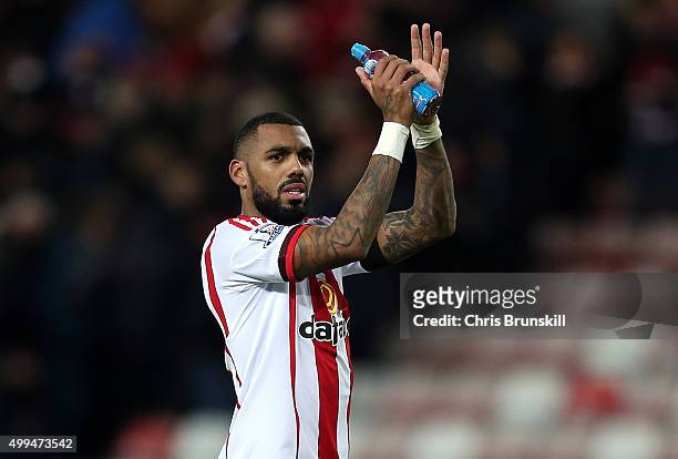 Yann M'Vila of Sunderland applauds the supporters at full-time following the Barclays Premier League match between Sunderland and Stoke City at...