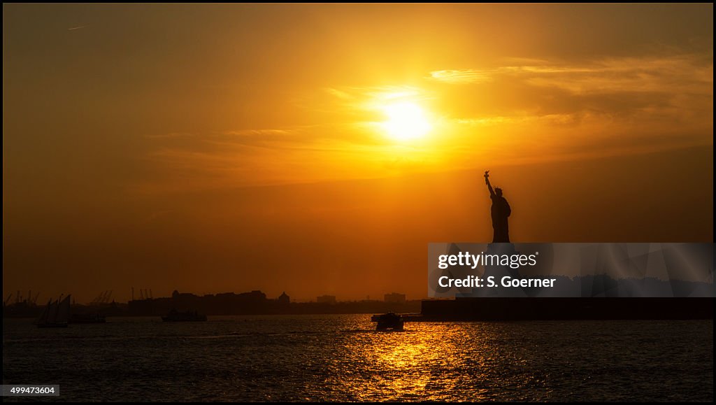 Statue of liberty during sunset