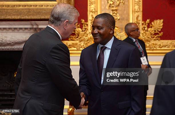 Prince Andrew, Duke of York speaks to Aliko Dangote during the London Global African Investment Summit at St James' Palace on December 1, 2015 in...