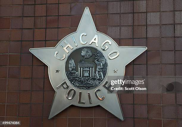 Chicago police badge hangs in front of the City of Chicago Public Safety Headquarters on December 1, 2015 in Chicago, Illinois. Following public...