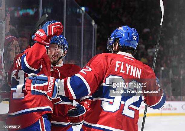 Paul Byron of the Montreal Canadiens celebrate after scoring a goal against the Columbus Blue Jackets in the NHL game at the Bell Centre on December...