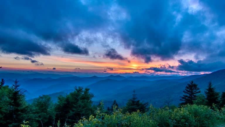https://media.gettyimages.com/id/499495905/video/vibrant-blue-ridge-mountain-sunset.jpg?b=1&s=640x640&k=20&c=14p1oXfD7GLvqs2Dqv8etbsPJ6RPZ8S1iFvZGdtWgzw=