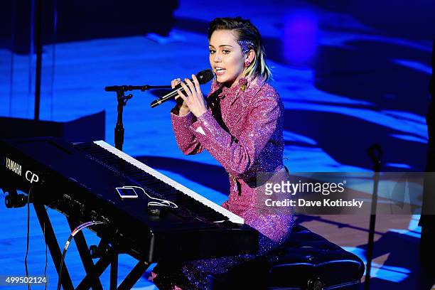 Musician Miley Cyrus performs on stage at the ONE Campaign and s concert to mark World AIDS Day, celebrate the incredible progress thats been made...