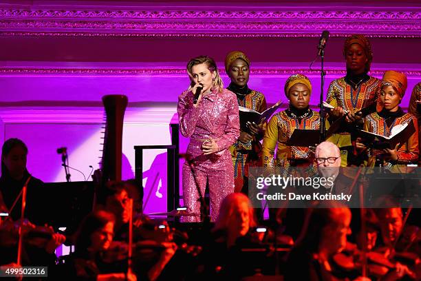 Musician Miley Cyrus performs on stage at the ONE Campaign and s concert to mark World AIDS Day, celebrate the incredible progress thats been made...