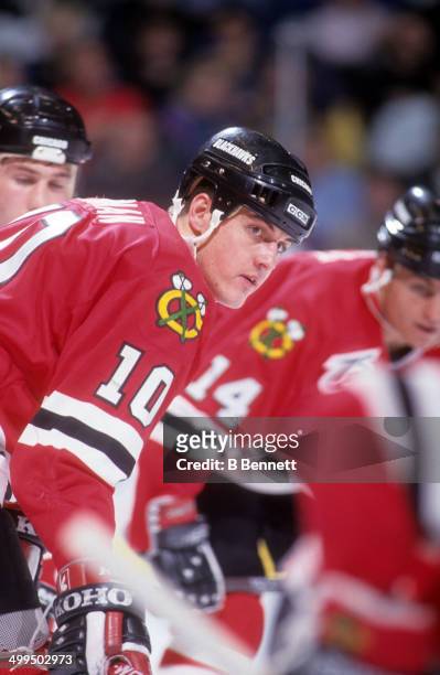 Brian Noonan of the Chicago Blackhawks stands on the ice during an NHL game against the New York Islanders on December 7, 1991 at the Nassau Coliseum...