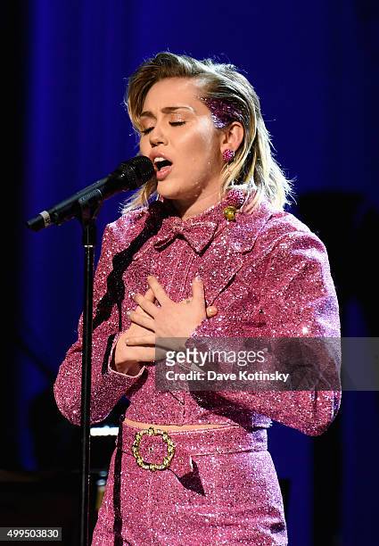 Musician Miley Cyrus performs on stage at the ONE Campaign and s concert to mark World AIDS Day, celebrate the incredible progress thats been made...