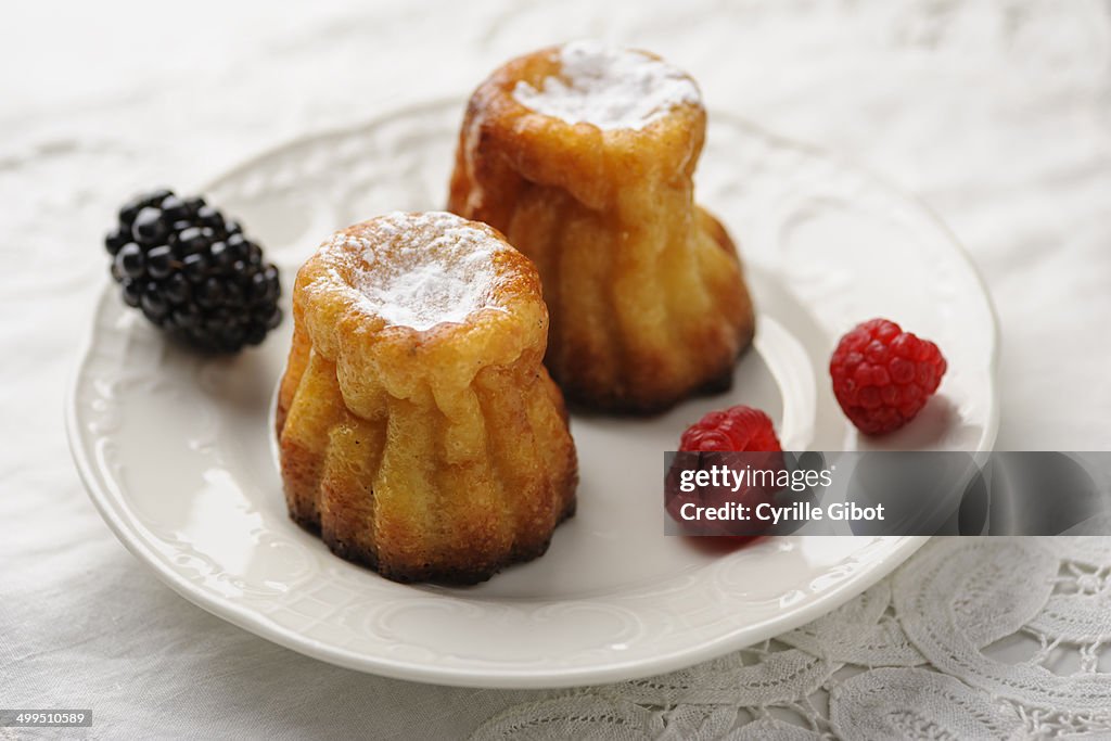 Cannelés on white plate