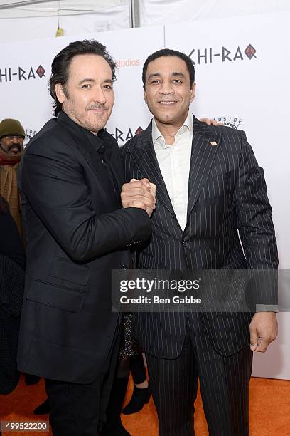 Actors John Cusack and Harry Lennix attend the "CHI-RAQ" New York Premiere at Ziegfeld Theater on December 1, 2015 in New York City.