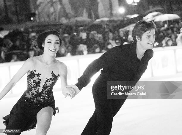 Ice dancers Meryl Davis and Charlie White perform during the 2015 Bryant Park Christmas tree lighting at Bryant Park on December 1, 2015 in New York...