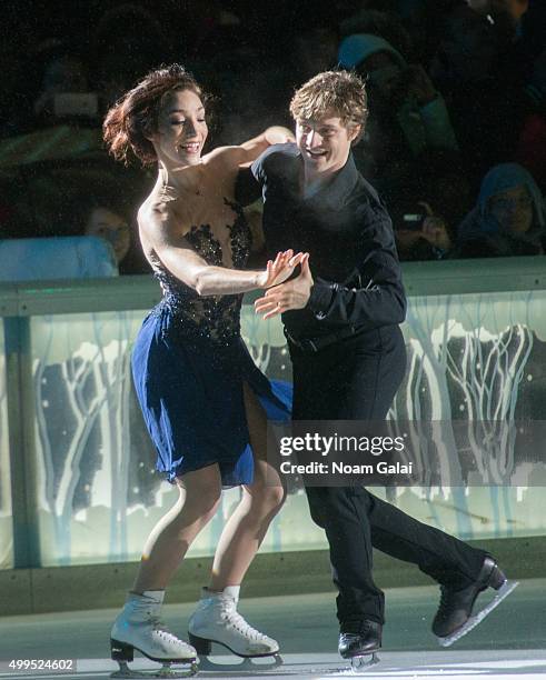 Ice dancers Meryl Davis and Charlie White perform during the 2015 Bryant Park Christmas tree lighting at Bryant Park on December 1, 2015 in New York...