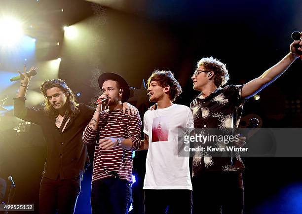 Singers Harry Styles, Liam Payne, Louis Tomlinson and Niall Horan of musical group One Direction perform onstage during 106.1 KISS FM's Jingle Ball...
