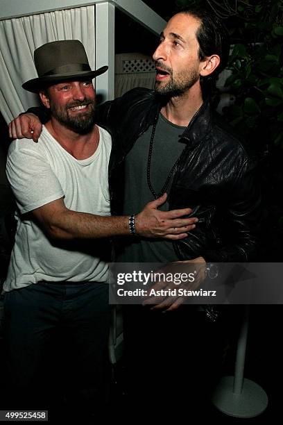 Brian Bowen Smith and Adrien Brody attends DuJour magazine's Jason Binn Celebrates Annual Art Basel Miami Beach Kick-Off Party presented by...