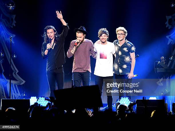 Singer Harry Styles, Liam Payne, Louis Tomlinson, and Niall Horan of One Direction perform onstage during 106.1 KISS FM's Jingle Ball 2015 presented...