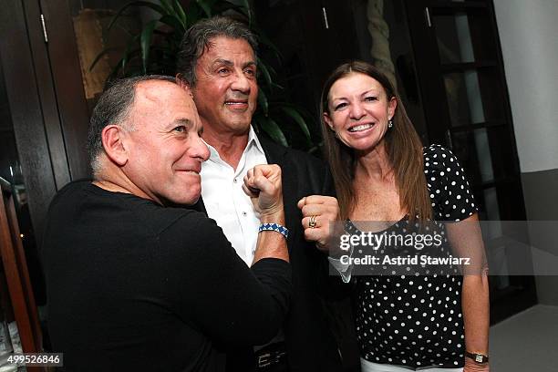 Jeff Miller, Sylvester Stallone and Esther Miller attend DuJour Magazine's Jason Binn Celebrates Annual Art Basel Miami Beach Kick-Off Party...