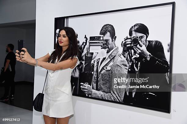 Model Thaila Ayala attend Opening of Lenny Kravitz FLASH Photography Exhibition at Miami Design District on December 1, 2015 in Miami, Florida.