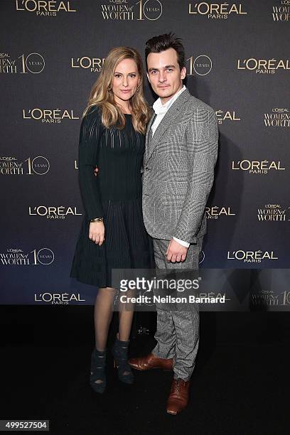 Oreal Paris Spokesperson Aimee Mullins and actor Rupert Friend attend the L'Oreal Paris Women of Worth 2015 Celebration - Arrivals at The Pierre...