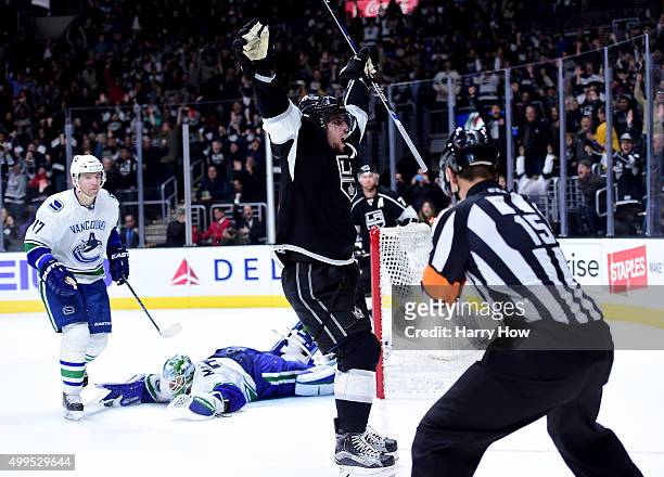 Anze Kopitar of the Los Angeles Kings celebrates his overtime goal in front of Radim Vrbata and Jacob Markstrom of the Vancouver Canucks 25 for a 2-1...