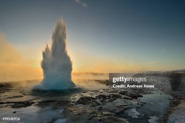 the geyser strokkur iceland in the early morning light. - geyser ストックフォトと画像