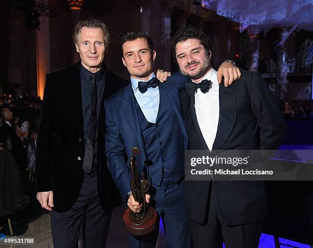 Goodwill Ambassador Liam Neeson, UNICEF Goodwill Ambassador Honoree: Audrey Hepburn Humanitarian Award, Orlando Bloom and Luca Dotti pose on stage at...