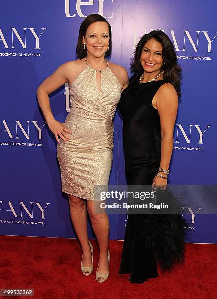 Actress Emily Bergl and Andrea Bernholtz, CEO Titan Industries, inc. Attend the 76th Annual Two Ten Footwear Foundation dinner and awards on December...