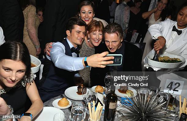 Orlando Bloom, guest, and UNICEF Goodwill Ambassador Liam Neeson attend the 11th Annual UNICEF Snowflake Ball Honoring Orlando Bloom, Mindy Grossman...