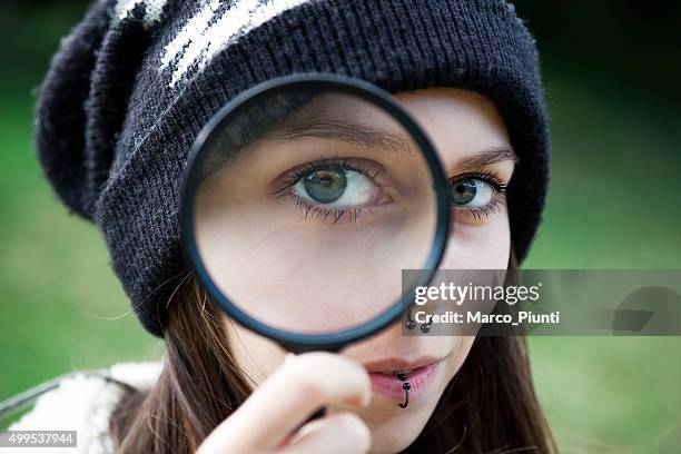 examine closely - looking closely stock pictures, royalty-free photos & images