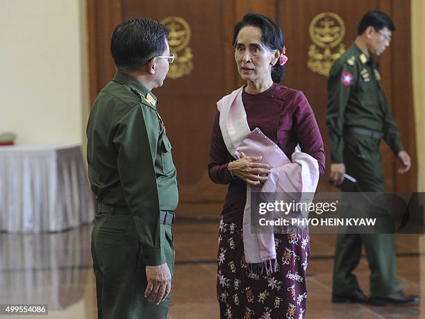 Senior General Min Aung Hlaing, Myanmar Commander In-Chief and National League for Democracy party leader Aung San Suu Kyi talk after their meeting...