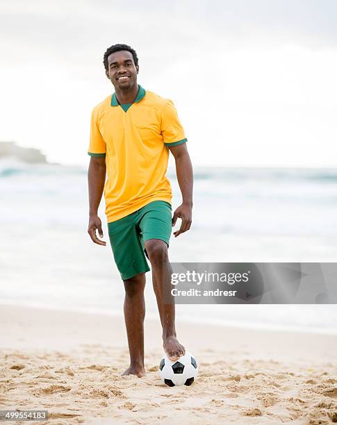 soccer player - football tee stock pictures, royalty-free photos & images