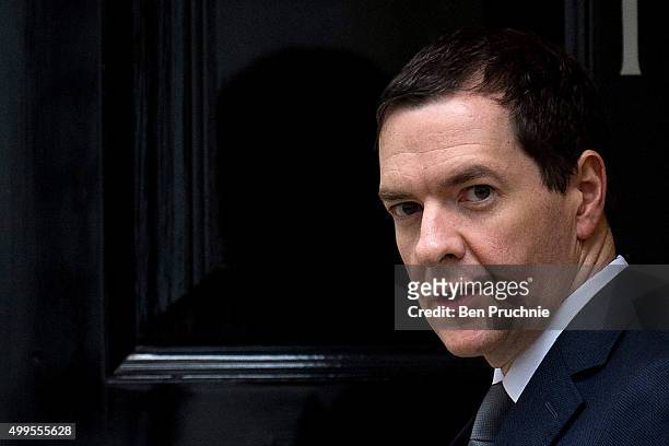 British Chancellor of the Exchequer George Osborne departs Number 11 Downing Street on December 2, 2015 in London, England. British MPs are expected...