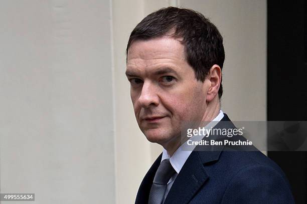 British Chancellor of the Exchequer George Osborne departs Number 11 Downing Street on December 2, 2015 in London, England. British MPs are expected...