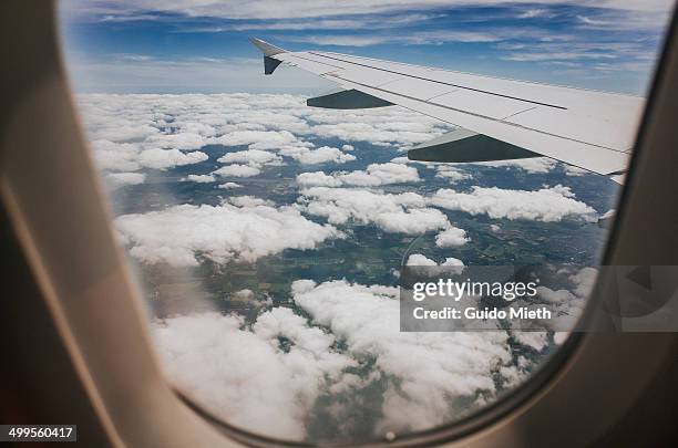 view out of airplane window. - airplane wing stock pictures, royalty-free photos & images