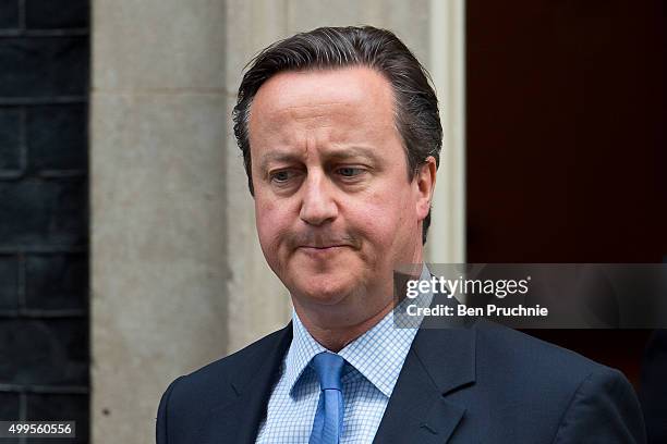 British Prime Minister David Cameron departs Number 10 Downing Street on December 2, 2015 in London, England. British MPs are expected to vote...