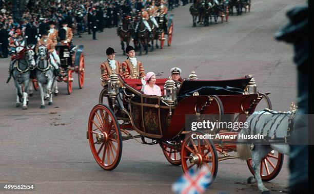 Queen Elizabeth ll and Prince Philip, Duke of Edinburgh ride in an open carriage during the Silver Jubilee celebrations on June 07, 1977 in London,...