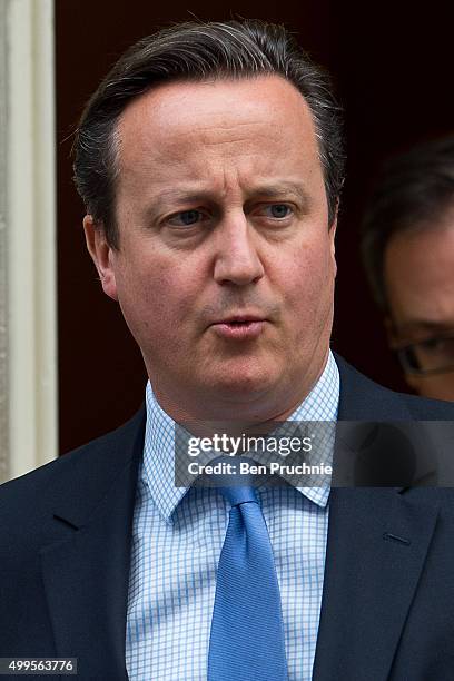 British Prime Minister David Cameron leaves 10 Downing Street on December 2, 2015 in London, England. British MPs are expected to vote tonight on...