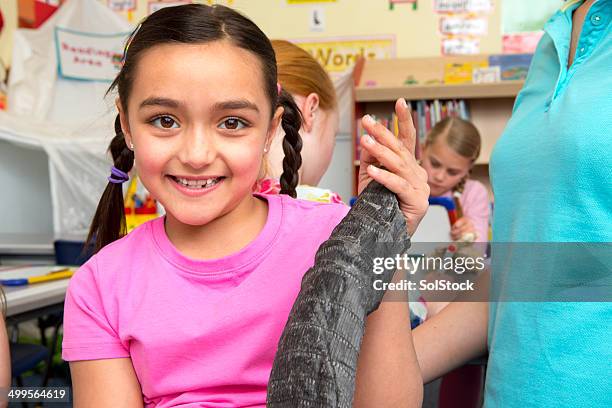 little girl in geology lesson - geology class stock pictures, royalty-free photos & images