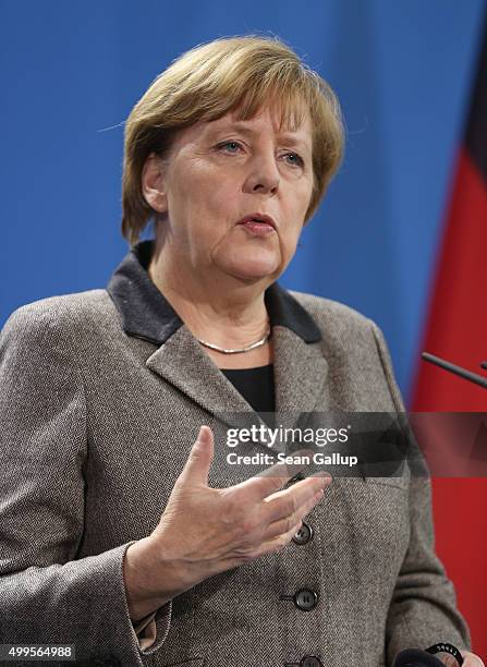 German Chancellor Angela Merkel and Afghan President Ashraf Ghani speak to the media following talks at the Chancellery on December 2, 2015 in...