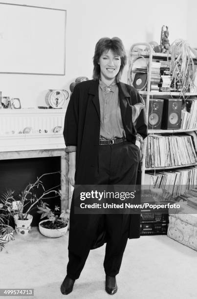 English singer Kiki Dee posed at home in London on 16th December 1984.