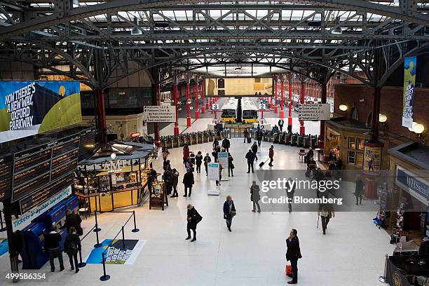 Train commuters walk through London Marylebone railway station, operated by The Chiltern Railway Company Ltd., in London, U.K., on Wednesday, Dec. 2,...