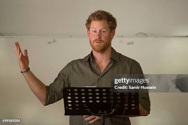 Prince Harry gives a speech as he visits the Southern African Wildlife College, a flagship centre close to Kruger National Park, during an official...