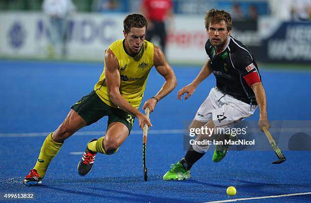 Dylan Wotherspoon of Australia vies with Moritz Furste of Germany during the match between Australia and Germany on day six of The Hero Hockey League...