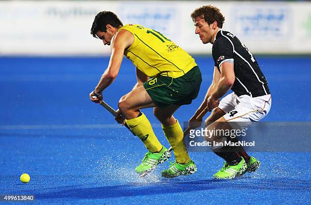 Matt Gohdes of Australia vies Jan Philipp Rabente of Germany during the match between Australia and Germany on day six of The Hero Hockey League...