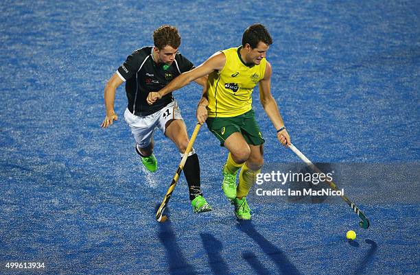 Matt Gohdes of Australia vies with Constanti Staib n of Germany during the match between Australia and Germany on day six of The Hero Hockey League...